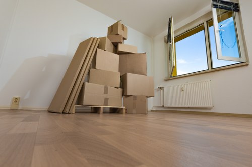 Student packing boxes prepared for storage in Hammersmith