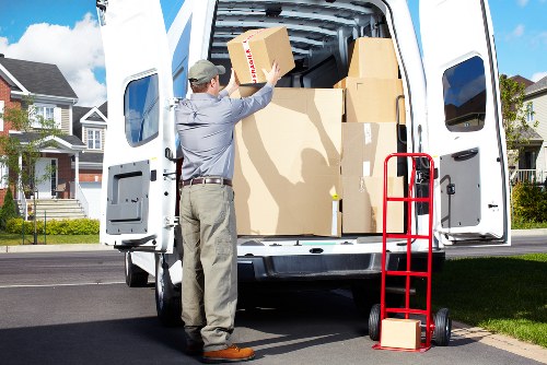 Staff member checking safety procedures in a storage unit area